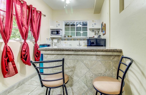 San Ignacio House | Lovely Home w/Balcony, Great View, Shared Pool, AC & WiFi - Ideal for Day Trips