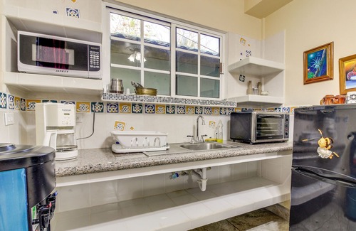 San Ignacio House | Lovely Home w/Balcony, Great View, Shared Pool, AC & WiFi - Ideal for Day Trips