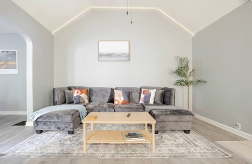 Indianapolis House | Lovely homey pad near Irvington with huge sofa, electric fireplace & porch swing