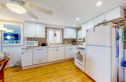 South Sanford House | Lovely lakefront home with deck, fire-pit, grill, private dock & pet friendly