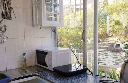 Da Lat House | Lovely Treehouse with 2 queen beds, restroom, small kitchen, balcony forest view