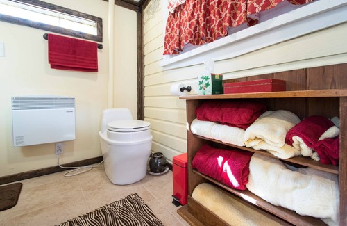 Exeter Cottage | Lucie's Hideway, artistic, bright, tiny house in the woods
