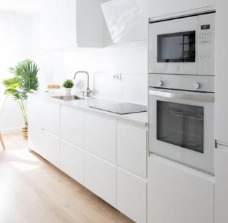 Distrito Oeste Apartment | Lujoso apartamento entre 2 playas con garaje, wifi