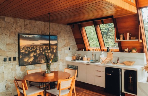 Alto Paraiso de Goias Cabin | Lume Cabin, A-frame cabin that combines comfort and elegance.
