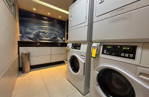 Setor Bueno Apartment | LUX26 - Flat Próx Órion Cozinha Completa com Varanda