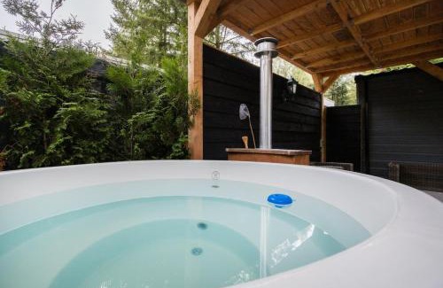 Bosgebied Hoenderloo Ski Chalet | Luxe Chalet Veluwe Sauna en Hottub
