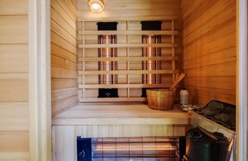 Bosgebied Hoenderloo Ski Chalet | Luxe Chalet Veluwe Sauna en Hottub
