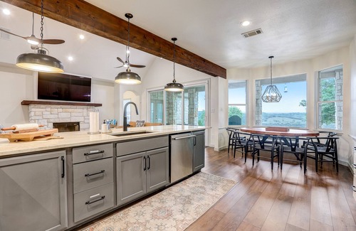 Oatmeal House | Luxe designer Hill Country home near Austin with amazing views & infinity pool