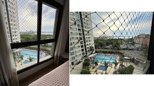 Penha Apartment | Luxo com Ar, Piscina Aquecida e Vista Mar