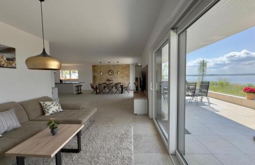 Muldestausee Villa | luxuriöse Villa Möwengeflüster - 220qm große Ferienwohnung für bis zu 8 Gästen mit Sauna direkt am Goitzschesee