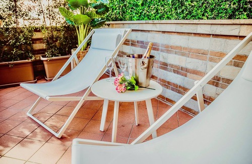 Quartiere XXXIII Lido di Ostia Ponente Apartment | Luxurious apartment with wellness cabin located in a historic building from 1900
