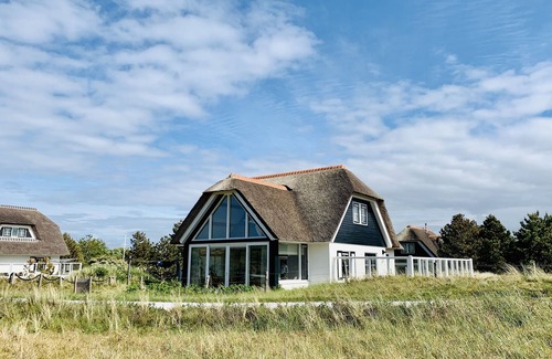 Hollum Villa | Luxurious dune villa on a walking distance to the beach with lighthouse view