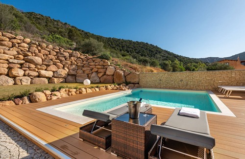Chia Villa | Luxurious Holiday Home with Terrace, Wi-Fi, Air Conditioning & Pool; Parking Available, Smaller Pets Allowed