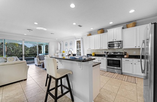 Reunion House | Luxurious pool home with theater 6 miles from Disneyworld