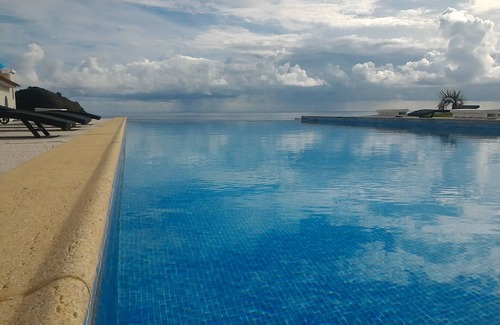 Vila Franca do Campo Villa | Luxurious seaside guest house with a shared pool and a breathtaking view