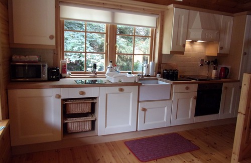 Ballyconnell Cabin | Luxurious Riverfront Log Cabin set in a tranquil woodland location