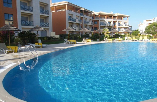 Montechoro Apartment | Luxurious spacious apartment with balconies overlooking pool & gardens A/C Wifi