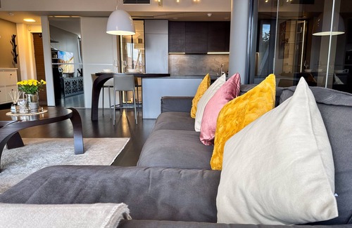 Old Town Apartment | Luxurious spacious apartment. Views of Kaunas City Park and Medieval City Wall.