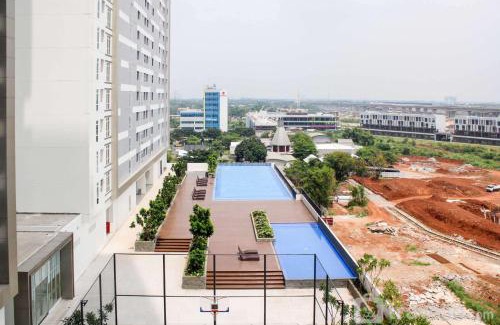 Cikarang Apartment | Luxurious Studio at Vasanta Innopark Apartment By Travelio