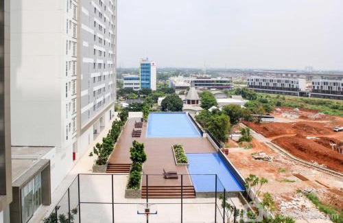 Cikarang Apartment | Luxurious Studio at Vasanta Innopark Apartment By Travelio