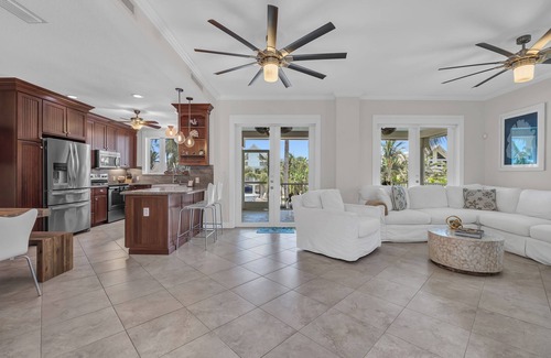 Stillwright Point House | Luxurious tropical water-front Heated pool home with Boat Dock and two master .