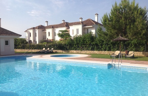 Arcos de la Frontera Condo | Luxury 2 bedroom Frontline Golf Townhouse with shared pool in a gated community