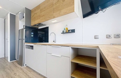 Jullouville-les-Pins House | Luxury 2-Bedroom Mobile Home with Heated Pool, Near Beach, Parking, and Wi-Fi