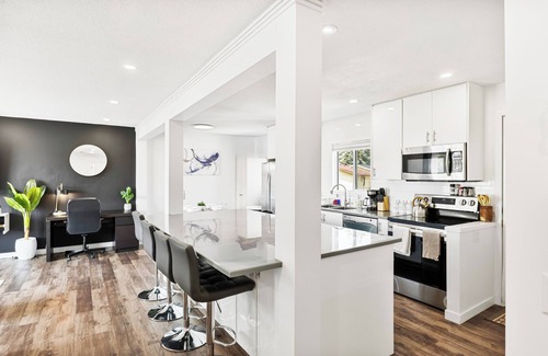 Southeast Calgary House | Luxury 2BR Home: A/C | Fast WiFi | BBQ | Rainfall Showers I Near Downtown