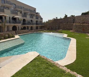 Qala Apartment | Luxury 3 Bed Apartment with Large Outdoor Pools and Gardens