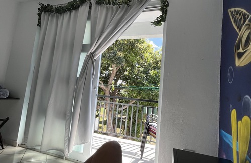 Aguadilla Pueblo House | Luxury 3 Bedroom Beach Apartment/High-Speed WIFI/Front n Back Balconies