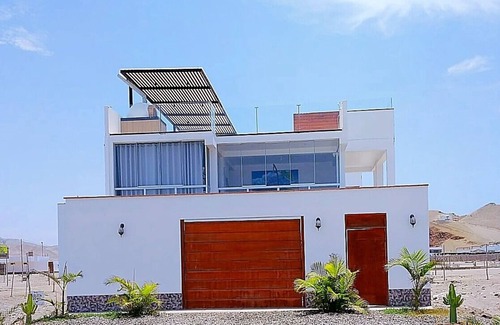 Cerro Azul House | Luxury 3- Story beach house with Rooftop pool & Artisan pizza oven.