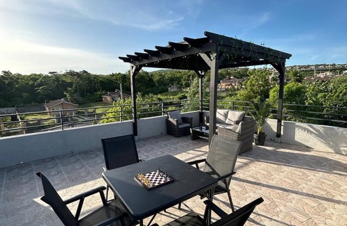 Florence Hall Village Villa | Luxury 5 Bedroom Villa in Gated Community 5 mins to beaches