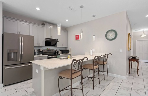Kissimmee House | Luxury 5 BR at Disney Universal free heated pool high chair stroller playpen