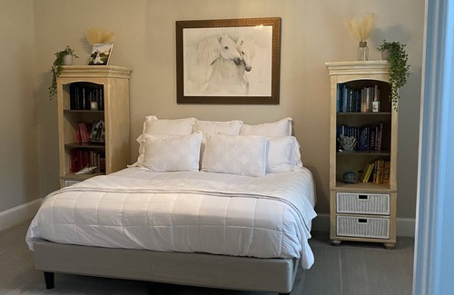 Waverly Resort | Luxury 7 bedroom mansion with horses, pool, hot tub, pond, swings and fire pit!