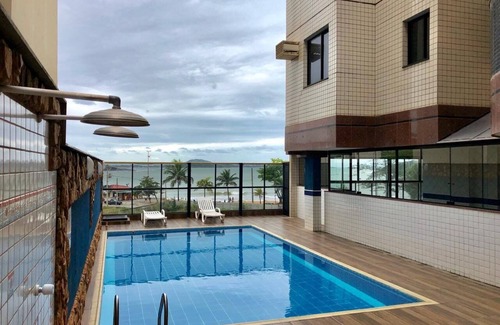 Praia do Morro Apartment | Luxury apartment in front of Praia do Morro with 5 suites and 4 parking spaces