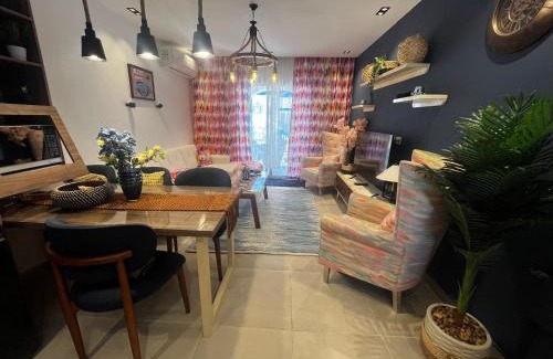 Ad-Dab'ah Ski Chalet | Luxury Chalet by the Pool ground floor with Private garden at Mountain View North Coast