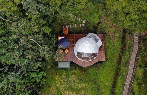 San Francisco House | Luxury glamping site located next to a stream