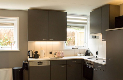 Lemmer House | Luxury holiday home with air conditioning, sauna, boats at private harbor.