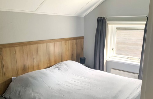 Lemmer House | Luxury holiday home with air conditioning, sauna, boats at private harbor.