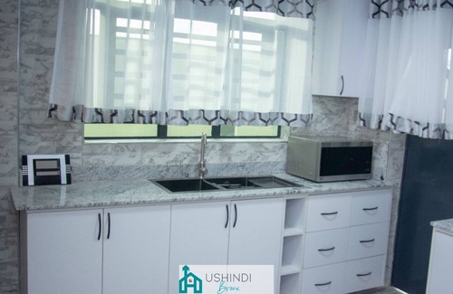 Kitengela Villa | Luxury Home with enough room for family. Rooftop dining with views.