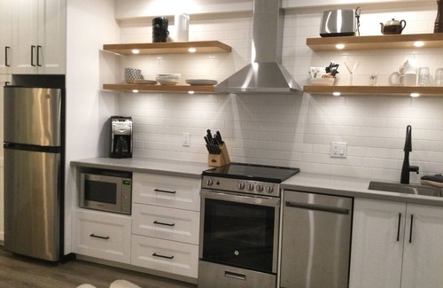 Village North Apartment | Luxury King Suite in Village North- The Nest