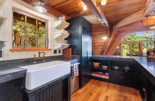 Serene Lakes House | Luxury lakefront home with private hot tub, on-site dock, fireplace & HOA beach