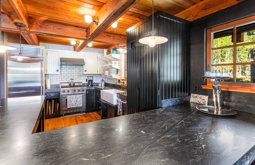 Serene Lakes House | Luxury lakefront home with private hot tub, on-site dock, fireplace & HOA beach