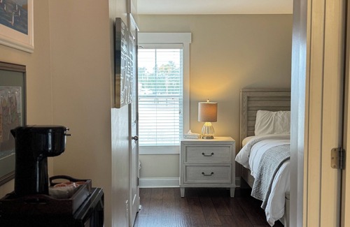 Elizabethtown Resort | Luxury Lodging, Lakefront View, Queen Bed w/Private Bath, Private Patio.