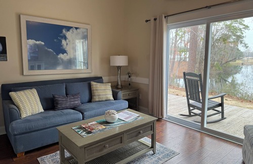 Elizabethtown Resort | Luxury Lodging, Lakefront View, Queen Bed w/Private Bath, Private Patio.