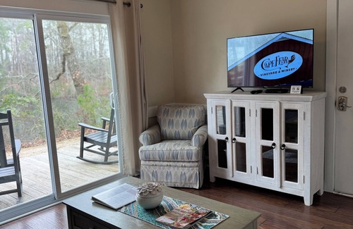 Elizabethtown Resort | Luxury Lodging, Lakefront View, Queen Bed w/Private Bath, Private Patio.