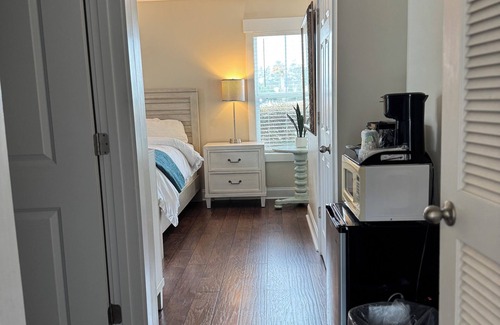 Elizabethtown Resort | Luxury Lodging, Lakefront View, Queen Bed w/Private Bath, Private Patio.
