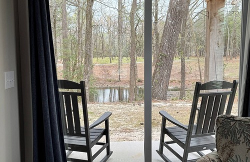 Elizabethtown Resort | Luxury Lodging, Lakefront View, King Bed w/Private Bath, Private Patio.