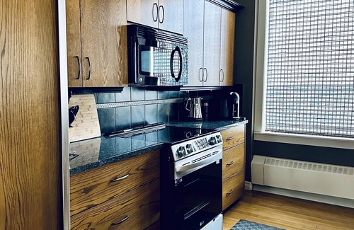 Regina Condo | Luxury NY Style Loft on Sub-Penthouse Level of Historic Western Trust Building