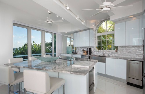 Cutthroat Harbor Estates House | Luxury * Panoramic Oceanfront Views * Boat Dock * Heated Pool
